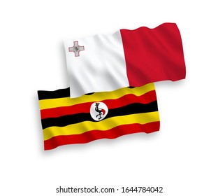 National vector fabric wave flags of Malta and Uganda isolated on white background. 1 to 2 proportion.