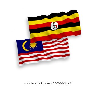 Nationale Vektorillustration-Wellen-Flaggen von Uganda und Malaysia einzeln auf weißem Hintergrund. 1 bis 2 %.