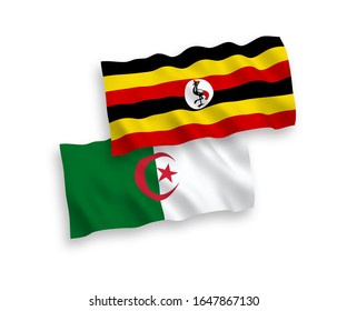 National vector fabric wave flags of Uganda and Algeria isolated on white background. 1 to 2 proportion.