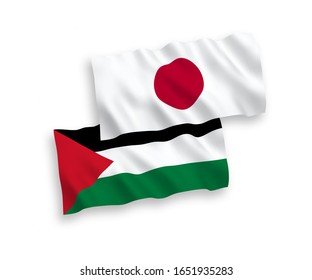 National vector fabric wave flags of Japan and Palestine isolated on white background. 1 to 2 proportion.