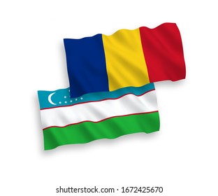 National vector fabric wave flags of Romania and Uzbekistan isolated on white background. 1 to 2 proportion.