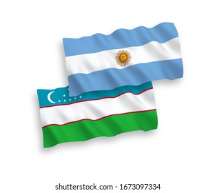 National vector fabric wave flags of Uzbekistan and Argentina isolated on white background. 1 to 2 proportion.