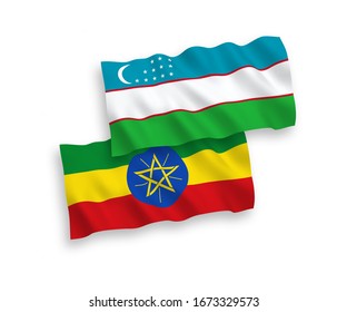 National vector fabric wave flags of Uzbekistan and Ethiopia isolated on white background. 1 to 2 proportion.