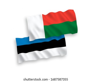 National vector fabric wave flags of Estonia and Madagascar isolated on white background. 1 to 2 proportion.