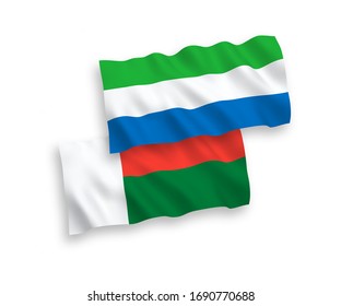 National vector fabric wave flags of Madagascar and Sierra Leone isolated on white background. 1 to 2 proportion.