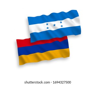 National vector fabric wave flags of Armenia and Honduras isolated on white background. 1 to 2 proportion.