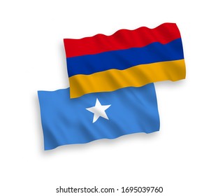 National vector fabric wave flags of Armenia and Somalia isolated on white background. 1 to 2 proportion.
