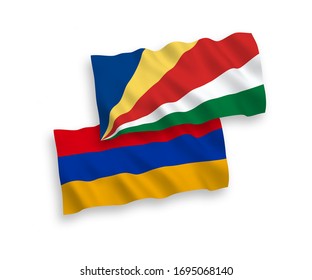 National vector fabric wave flags of Armenia and Seychelles isolated on white background. 1 to 2 proportion.