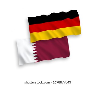 National vector fabric wave flags of Germany and Qatar isolated on white background. 1 to 2 proportion.