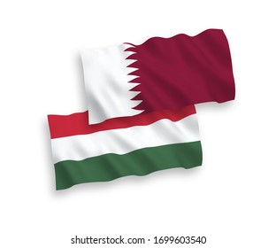 National vector fabric wave flags of Qatar and Hungary isolated on white background. 1 to 2 proportion.