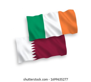 National vector fabric wave flags of Ireland and Qatar isolated on white background. 1 to 2 proportion.