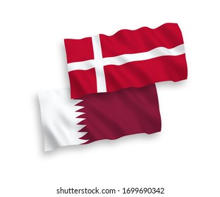 National vector fabric wave flags of Denmark and Qatar isolated on white background. 1 to 2 proportion.