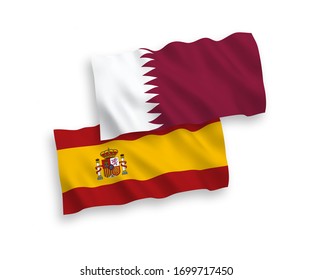 National vector fabric wave flags of Qatar and Spain isolated on white background. 1 to 2 proportion.