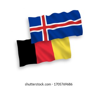 National vector fabric wave flags of Iceland and Belgium isolated on white background. 1 to 2 proportion.