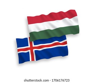 Banderas de olas de tela vectorial nacional de Islandia y Hungría aisladas en fondo blanco. 1 a 2 proporciones.