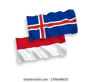 National vector fabric wave flags of Indonesia and Iceland isolated on white background. 1 to 2 proportion.