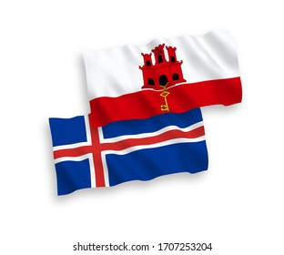 National vector fabric wave flags of Iceland and Gibraltar isolated on white background. 1 to 2 proportion.