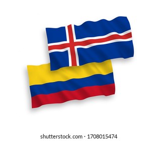 National vector fabric wave flags of Iceland and Colombia isolated on white background. 1 to 2 proportion.