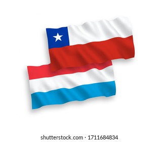 National vector fabric wave flags of Chile and Luxembourg isolated on white background. 1 to 2 proportion.