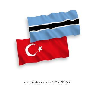 National vector fabric wave flags of Turkey and Botswana isolated on white background. 1 to 2 proportion.