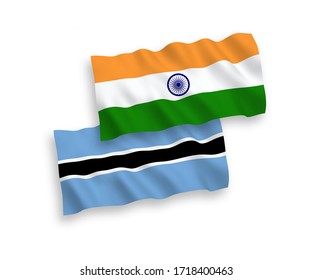 National vector fabric wave flags of India and Botswana isolated on white background. 1 to 2 proportion.