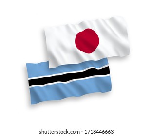 National vector fabric wave flags of Japan and Botswana isolated on white background. 1 to 2 proportion.
