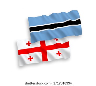 National vector fabric wave flags of Botswana and Georgia isolated on white background. 1 to 2 proportion.