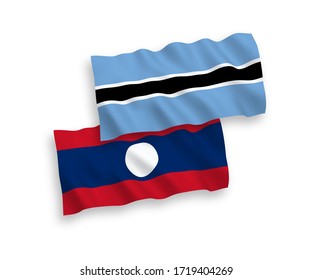 National vector fabric wave flags of Botswana and Laos isolated on white background. 1 to 2 proportion.