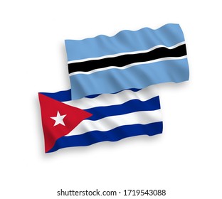 National vector fabric wave flags of Botswana and Cuba isolated on white background. 1 to 2 proportion.