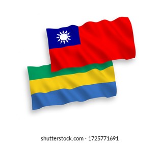 National vector fabric wave flags of Gabon and Taiwan isolated on white background. 1 to 2 proportion.