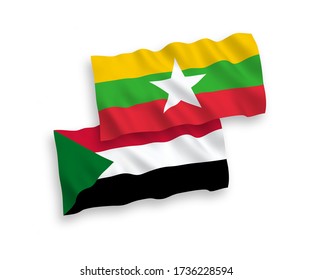 National vector fabric wave flags of Sudan and Myanmar isolated on white background. 1 to 2 proportion.