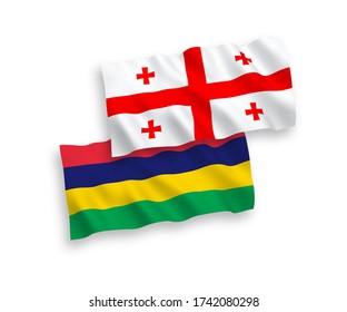 National vector fabric wave flags of Mauritius and Georgia isolated on white background. 1 to 2 proportion.