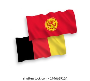 National vector fabric wave flags of Kyrgyzstan and Belgium isolated on white background. 1 to 2 proportion.