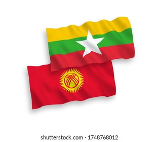 Banderas de olas de tela vectorial nacional de Kirguistán y Myanmar aisladas en fondo blanco. de 1 a 2.