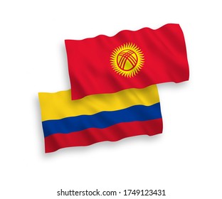 National vector fabric wave flags of Kyrgyzstan and Colombia isolated on white background. 1 to 2 proportion.
