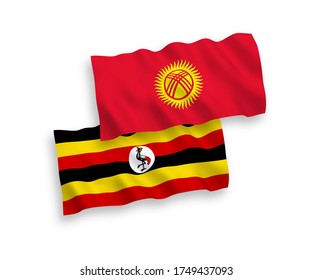 National vector fabric wave flags of Kyrgyzstan and Uganda isolated on white background. 1 to 2 proportion.