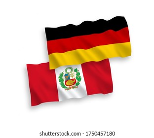 National vector fabric wave flags of Germany and Peru isolated on white background. 1 to 2 proportion.
