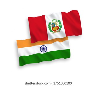 National vector fabric wave flags of India and Peru isolated on white background. 1 to 2 proportion.