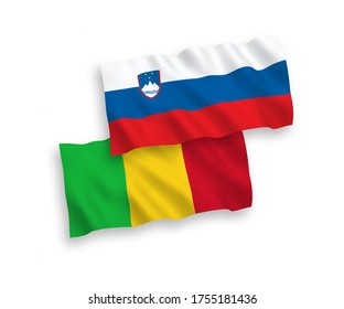 National vector fabric wave flags of Slovenia and Mali isolated on white background. 1 to 2 proportion.