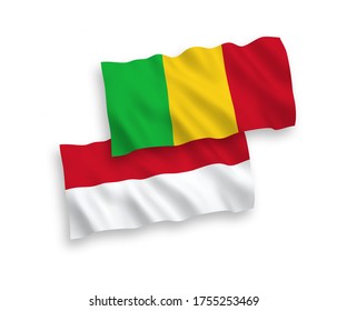National vector fabric wave flags of Indonesia and Mali isolated on white background. 1 to 2 proportion.