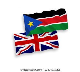 National vector fabric wave flags of Great Britain and Republic of South Sudan isolated on white background. 1 to 2 proportion.
