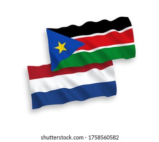 National vector fabric wave flags of Republic of South Sudan and Netherlands isolated on white background. 1 to 2 proportion.