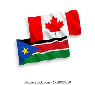 National vector fabric wave flags of Canada and Republic of South Sudan isolated on white background. 1 to 2 proportion.