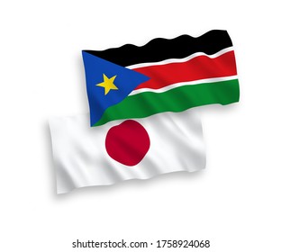 National vector fabric wave flags of Japan and Republic of South Sudan isolated on white background. 1 to 2 proportion.