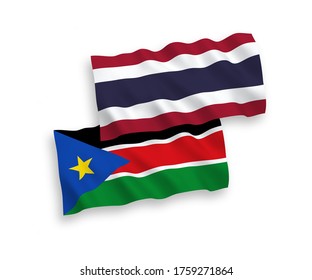 National vector fabric wave flags of Republic of South Sudan and Thailand isolated on white background. 1 to 2 proportion.
