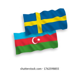 National vector fabric wave flags of Sweden and Azerbaijan isolated on white background. 1 to 2 proportion.