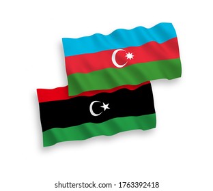 National vector fabric wave flags of Azerbaijan and Libya isolated on white background. 1 to 2 proportion.