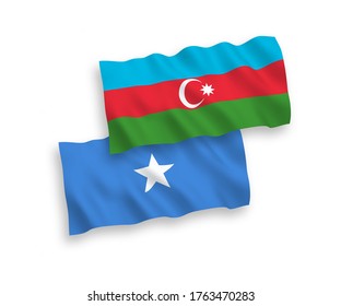 National vector fabric wave flags of Azerbaijan and Somalia isolated on white background. 1 to 2 proportion.