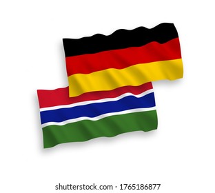 National vector fabric wave flags of Germany and Republic of Gambia isolated on white background. 1 to 2 proportion.