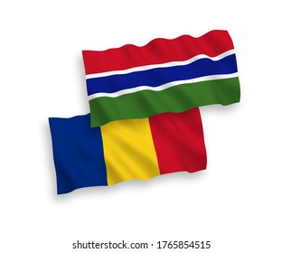 National vector fabric wave flags of Romania and Republic of Gambia isolated on white background. 1 to 2 proportion.